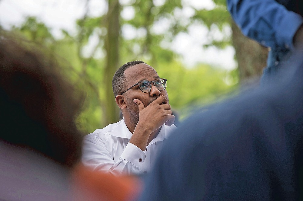 Dozens of Black farmers gather in Byromville, Ga., on Tuesday, May 4, 2021, to hear U.S. Sen. Rev. Raphael Warnock detail the federal COVID-19 relief coming to them and voice concerns of the history of discrimination against them at the hands of the United States Department of Agriculture. (Riley Bunch/The Daily Times via AP)