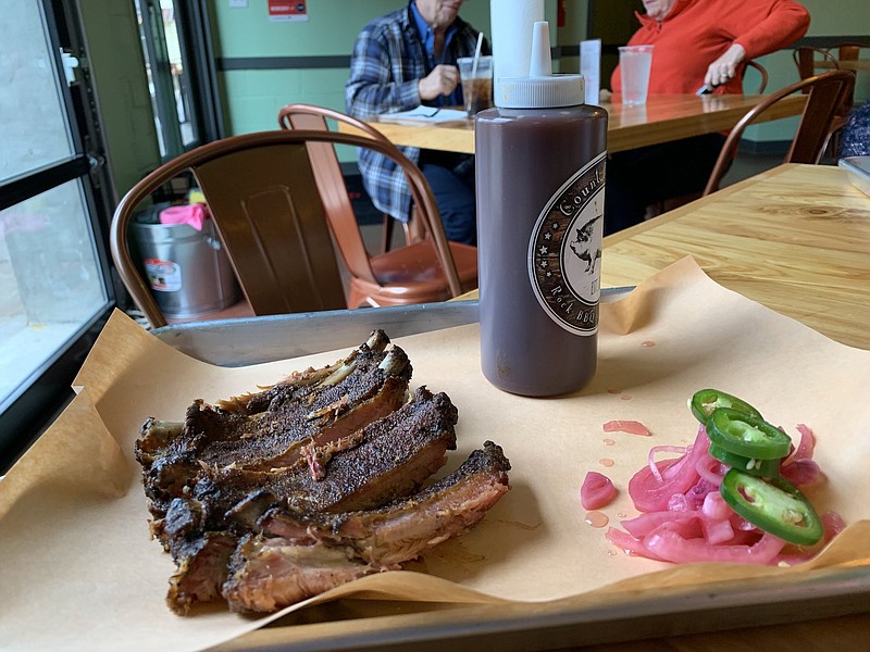 A quarter-rack of ribs at Count Porkula's Rail Yard operation: A new partnership will give the barbecue restaurant a second outlet in Little Rock's Pulaski Heights. (Democrat-Gazette file photo/Eric E. Harrison)