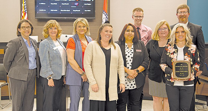 COURTESY PHOTO
Lincoln Middle School has been named a 2021 Arkansas Opportunity Culture Model School. Principal Michele Price, right, and her three Multi-Classroom Leaders received the award recently from Johnny Key, Arkansas Education Secretary, and other state education leaders.