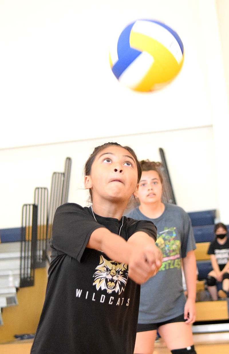 Westside Eagle Observer/MIKE ECKELS
Shaylee Morales keeps her eyes on the ball as she hits it back over the net during the junior high volleyball practice session June 9 in the gym at Decatur Middle School. Both the junior and senior high teams began weekly practice session in preparation for the upcoming volleyball season which starts in late August.