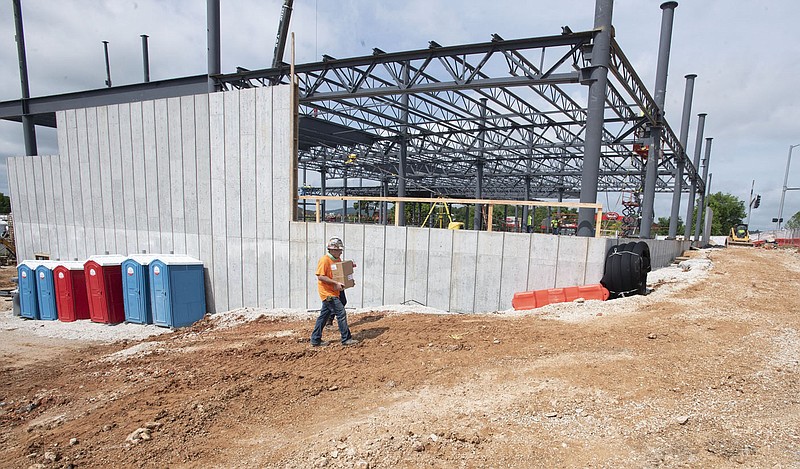 Construction continues Tuesday June 8, 2021 at the University of Arkansas School of Art Windgate Studio and Design Center building at the corner of Martin Luther King Blvd. and Hill Ave. in Fayetteville. The building will be ready for students and faculty in the fall of 2022. There will be studios, critique and gallery spaces and nontraditional classrooms. The project was paid for with a 40 million dollar gift from the Windgate Charitable Foundation. Visit nwaonline.com/2100609Daily/ and nwadg.com/photo. (NWA Democrat-Gazette/J.T. Wampler)