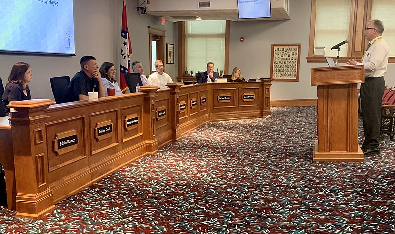 Kelly Hayes, deputy superintendent, presents the district's monthly financials to the School Board Tuesday at the board's monthly meeting. (NWA Democrat-Gazette/Mary Jordan)