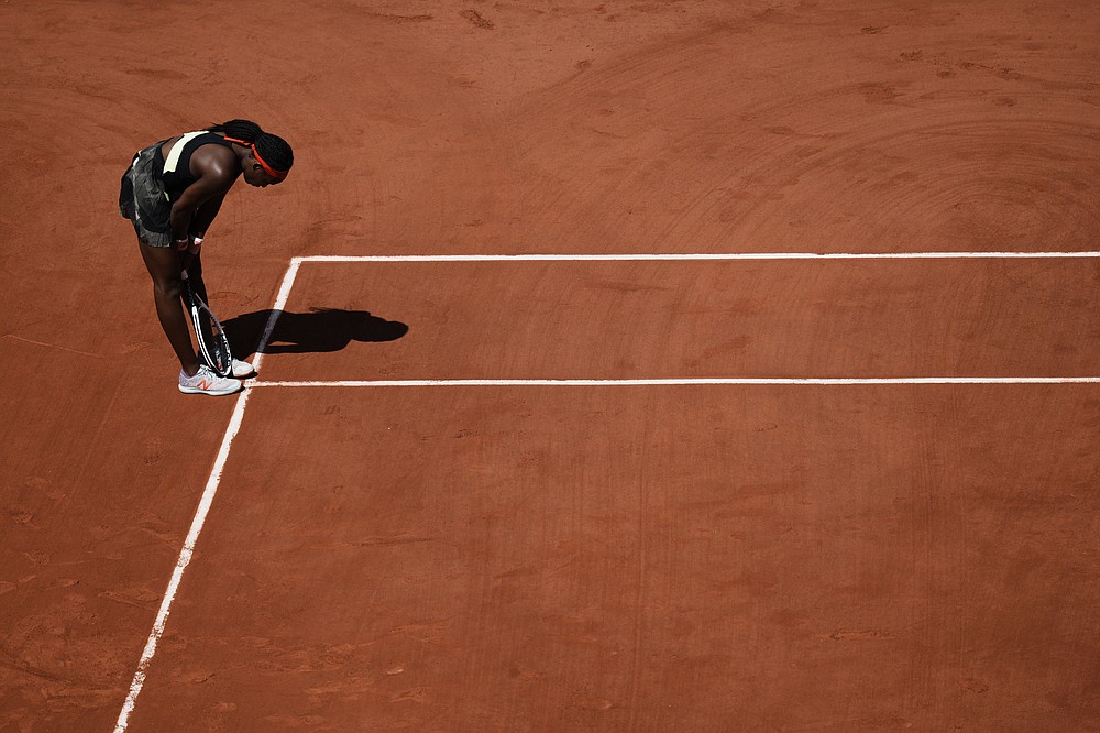 United States's Coco Gauff reacts on the court as she plays Czech Republic's Barbora Krejcikova during their quarterfinal match of the French Open tennis tournament at the Roland Garros stadium Wednesday, June 9, 2021 in Paris. (AP Photo/Thibault Camus)