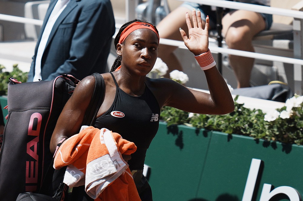 United States's Coco Gauff leaves the court after losing to Czech Republic's Barbora Krejcikova in their quarterfinal match of the French Open tennis tournament at the Roland Garros stadium Wednesday, June 9, 2021 in Paris. Krejcikova won 7-6, 6-3. (AP Photo/Thibault Camus)