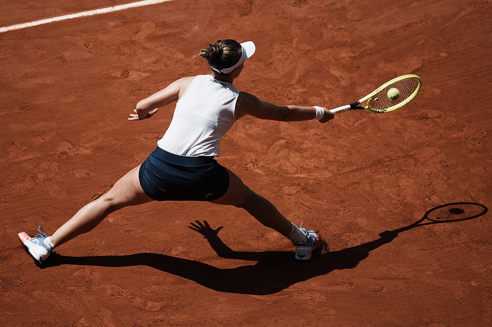 Czech Republic's Barbora Krejcikova returns the ball to United States's Coco Gauff during their quarterfinal match of the French Open tennis tournament at the Roland Garros stadium Wednesday, June 9, 2021 in Paris. (AP Photo/Thibault Camus)