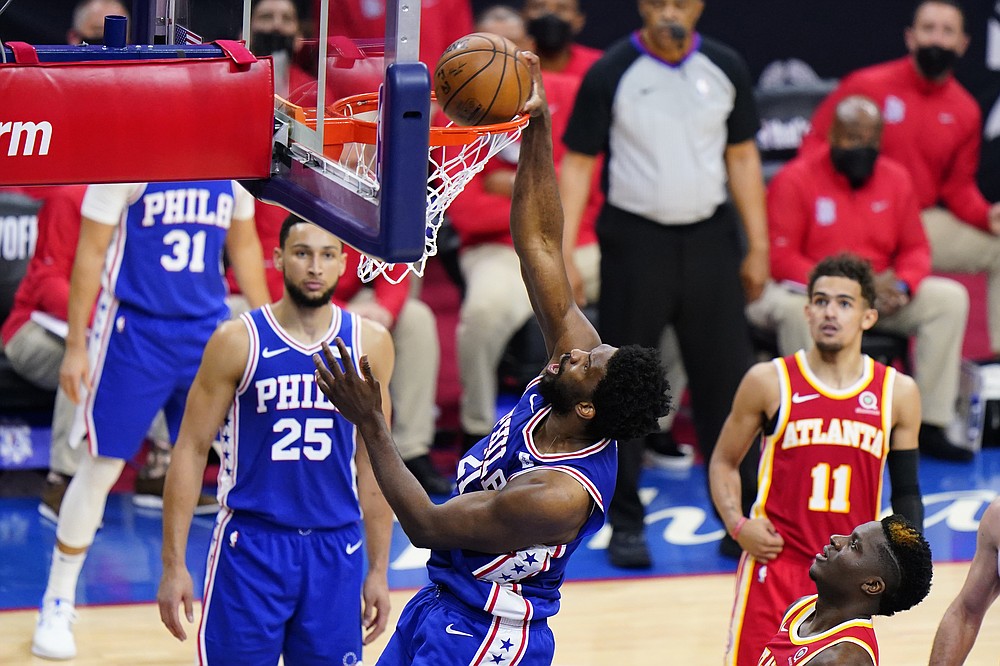 Philadelphia 76ers' Joel Embiid dunks the ball during the first half of Game 2 in a second-round NBA basketball playoff series against the Atlanta Hawks, Tuesday, June 8, 2021, in Philadelphia. (AP Photo/Matt Slocum)