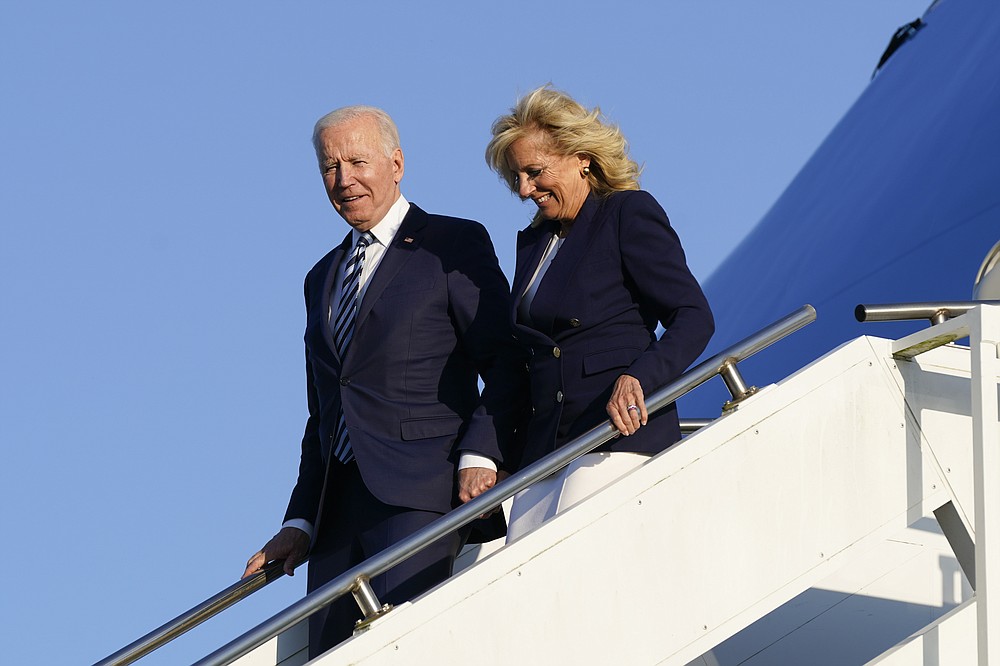 President Joe Biden and first lady Jill Biden step off Air Force One at RAF Mildenhall in Suffolk, England, Wednesday, June 9, 2021. (AP Photo/Patrick Semansky)