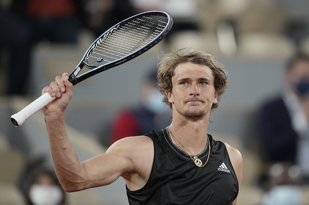 Germany's Alexander Zverev celebrates after defeating Serbia's Laslo Djere during their third round match on day 6, of the French Open tennis tournament at Roland Garros in Paris, France, Friday, June 4, 2021. (AP Photo/Christophe Ena)