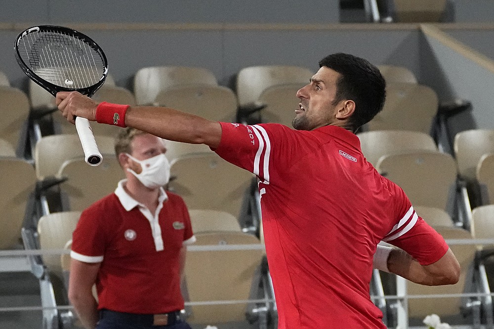 Serbia's Novak Djokovic reacts as he defeats Italy's Matteo Berrettini in a quarterfinal match of the French Open tennis tournament at the Roland Garros stadium Wednesday, June 9, 2021 in Paris. (AP Photo/Michel Euler)