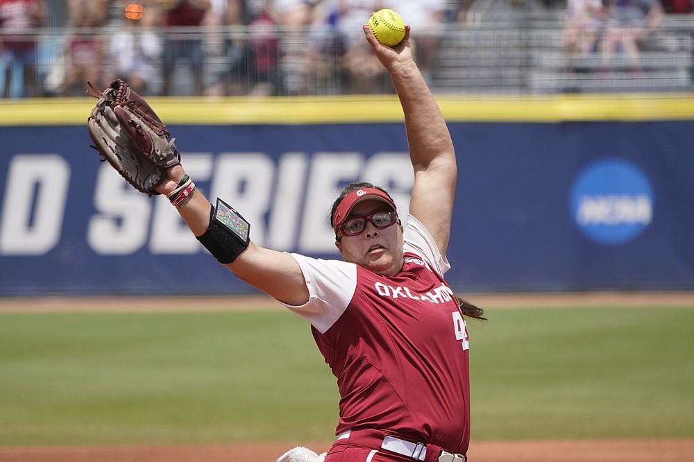 Oklahoma's Giselle Juarez (45) pitches in the first inning against Florida State in the final game of the NCAA Women's College World Series softball championship series Thursday, June 10, 2021, in Oklahoma City. (AP Photo/Sue Ogrocki)