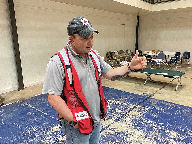 Mike Ingram, an official with the American Red Cross, discusses Thursday the process for assessing flood damage in the area around Gould, where the agency has set up a shelter.
(Pine Bluff Commercial/Byron Tate)