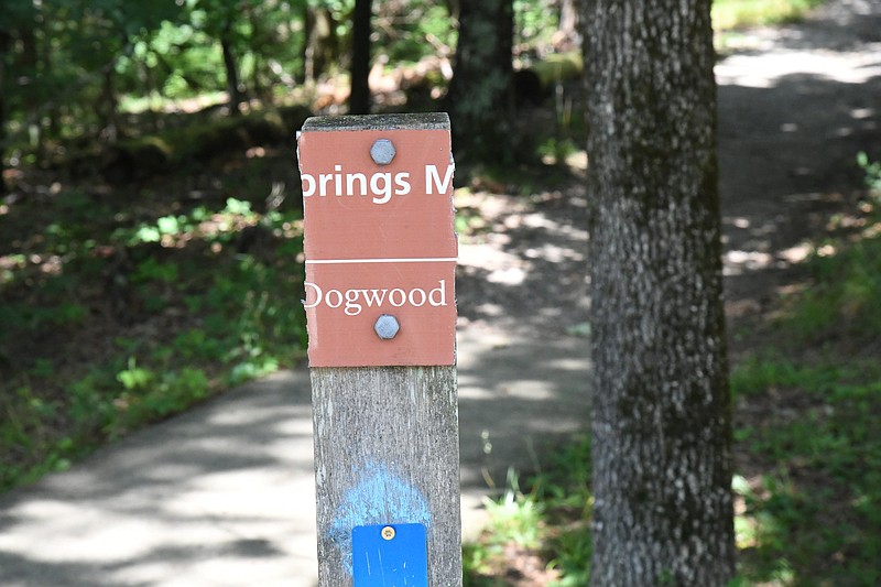A damaged trail sign in Hot Springs National Park near Hot Springs Mountain Tower is shown. - Photo by Tanner Newton of The Sentinel-Record