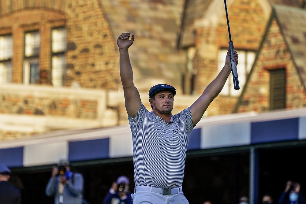 FILE - In this Sept. 20, 2020, file photo, Bryson DeChambeau, of the United States, reacts after sinking a putt for par on the 18th hole to win the U.S. Open golf tournament in Mamaroneck, N.Y. DeChambeau will try to win back-to-back on June 17-20 in the U.S. Open at Torrey Pines. (AP Photo/Charles Krupa, File)