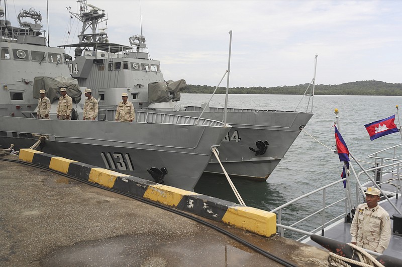 FILE - In this July 26, 2019, file photo, Cambodian navy crew members stand on a navy patrol boat at the Ream Naval Base in Sihanoukville, southwest of Phnom Penh, Cambodia. Efforts by Cambodia to assuage U.S. concerns about China’s rights to use a naval base on the Gulf of Thailand suffered a setback Friday, June 11, 2021, when an American diplomat invited to inspect it was allowed only limited access, according to the U.S. Embassy. (AP Photo/Heng Sinith, File)