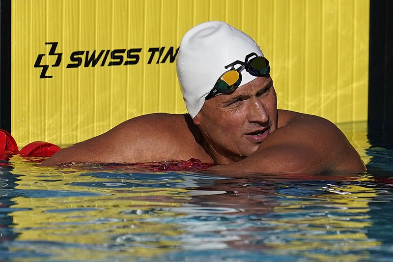 Ryan Lochte pauses after competing in the men's 200-meter freestyle preliminary race on April 8 at the TYR Pro Swim Series swim meet in Mission Viejo, Calif. Lochte, the swimmer who embarrassed himself and the U.S. five years ago in Rio de Janeiro, is seeking to make a record-tying Olympic team. - Photo by Ashley Landis of The Associated Press