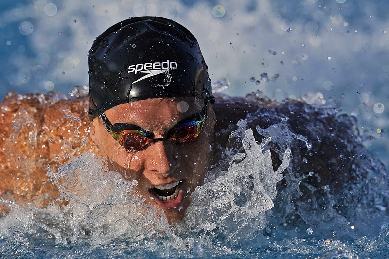 FILE - In this April 8, 2021, file photo Caeleb Dressel competes in the men's 100 meter butterfly prelim at the TYR Pro Swim Series swim meet in Mission Viejo, Calif. (AP Photo/Ashley Landis, File)