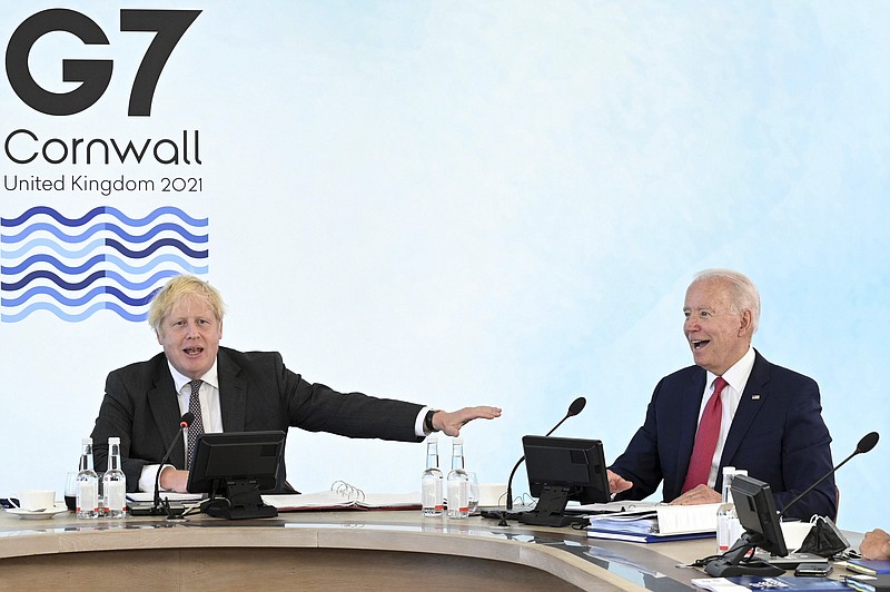 Britain's Prime Minister Boris Johnson, left, and US President Joe Biden during the G7 summit in Cornwall, England, Saturday June 12, 2021. (Leon Neal/Pool via AP)