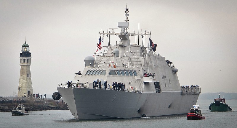 The new USS Little Rock arrives at Buffalo harbor with a police and fireboat escort, Monday, Dec. 4, 2017, in Buffalo, N.Y. The littoral combat ship will be docked on the Lake Erie waterfront until its commissioning Dec. 16, 2017. (AP Photo/Carolyn Thompson)