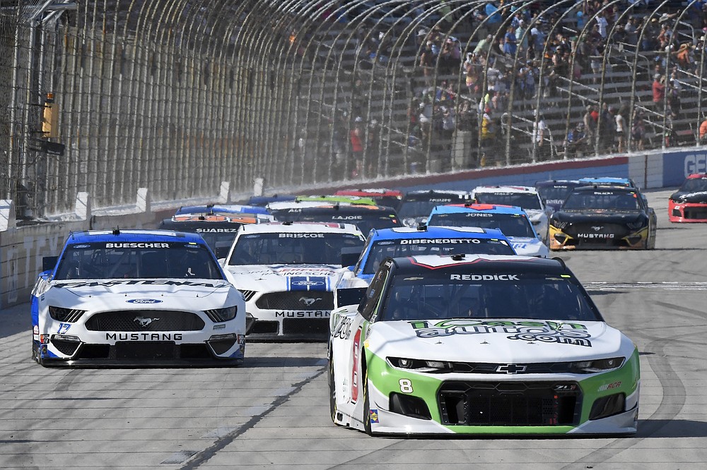 Tyler Reddick (8) leads the field into Turn 1 during the NASCAR All-Star Open Cup Series auto race at Texas Motor Speedway in Fort Worth, Texas, Sunday, June 13, 2021. (AP Photo/Larry Papke)