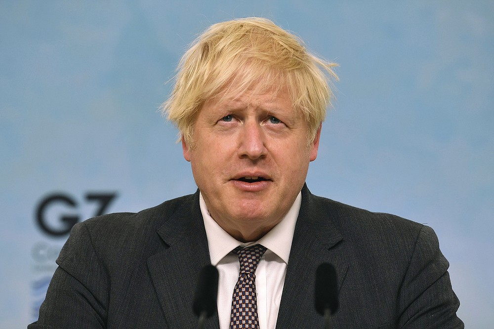 Britain's Prime Minister Boris Johnson speaks, during a press conference on the final day of the G7 summit in Carbis Bay, Cornwall, England, Sunday June 13, 2021. (Ben Stansall/Pool Photo via AP)