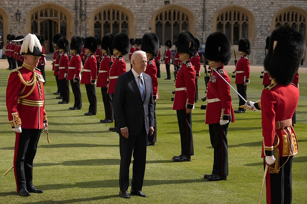 US President Joe Biden inspects a Guard of Honour after arriving to meet Britain's Queen Elizabeth II at Windsor Castle near London, Sunday, June 13, 2021. (AP Photo/Matt Dunham, Pool)