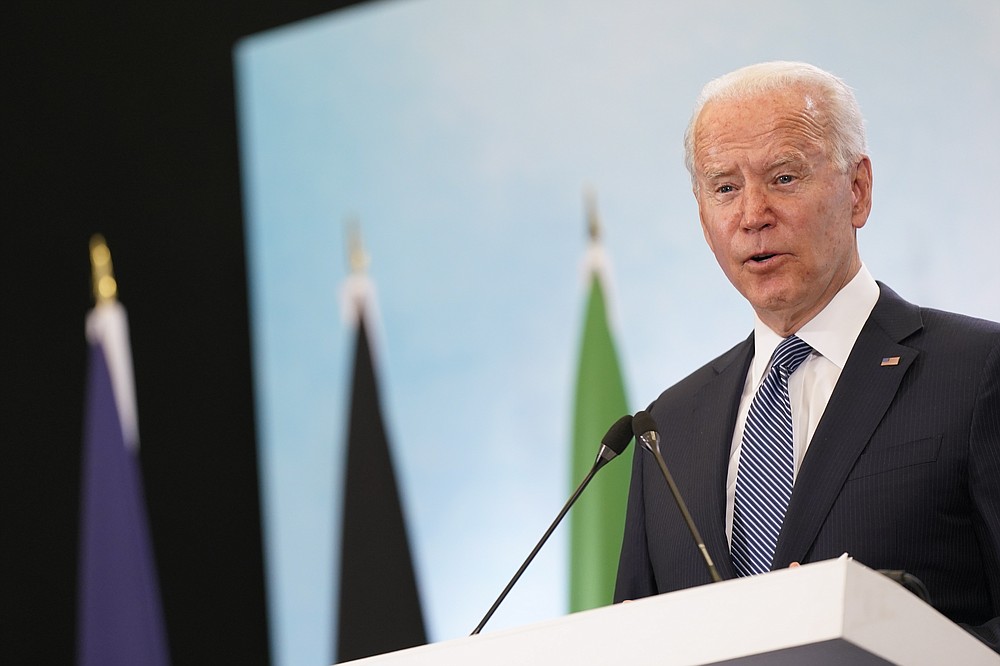 President Joe Biden speaks during a news conference after attending the G-7 summit, Sunday, June 13, 2021, at Cornwall Airport in Newquay, England. Biden is en route to Windsor, England, to meet with Queen Elizabeth II, and then on to Brussels to attend the NATO summit. (AP Photo/Patrick Semansky)