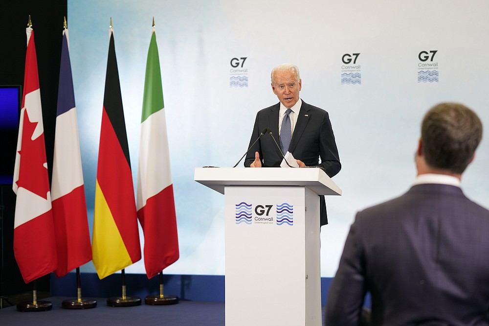 President Joe Biden speaks during a news conference after attending the G-7 summit, Sunday, June 13, 2021, at Cornwall Airport in Newquay, England. Biden is en route to Windsor, England, to meet with Queen Elizabeth II, and then on to Brussels to attend the NATO summit. (AP Photo/Patrick Semansky)