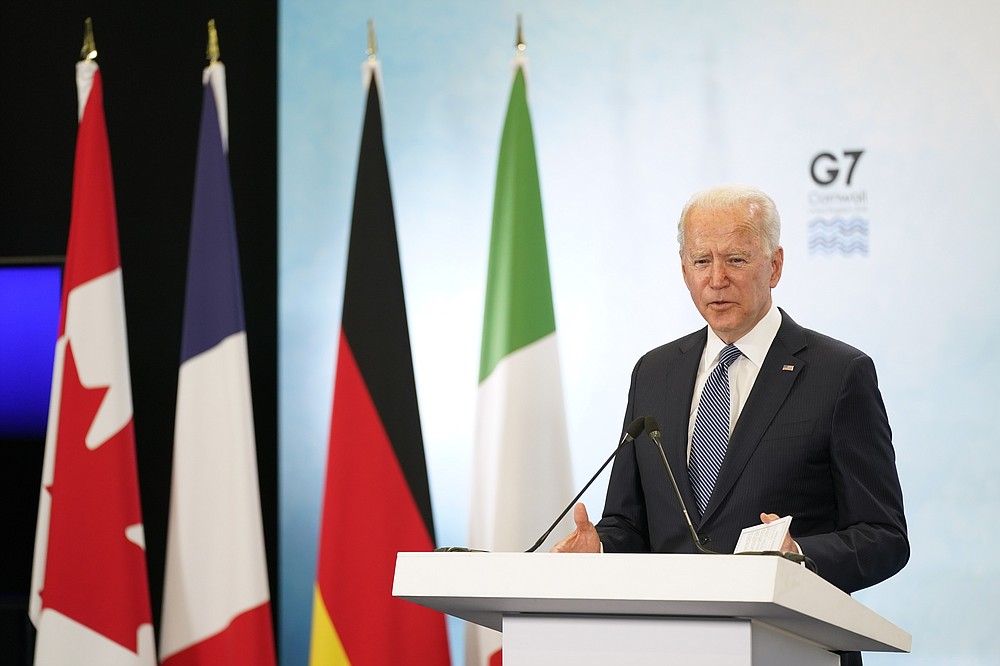 President Joe Biden speaks during a news conference after attending the G-7 summit, Sunday, June 13, 2021, at Cornwall Airport in Newquay, England. Biden is en route to Windsor, England, to meet with Queen Elizabeth II, and then on to Brussels to attend the NATO summit. (AP Photo/Patrick Semansky)