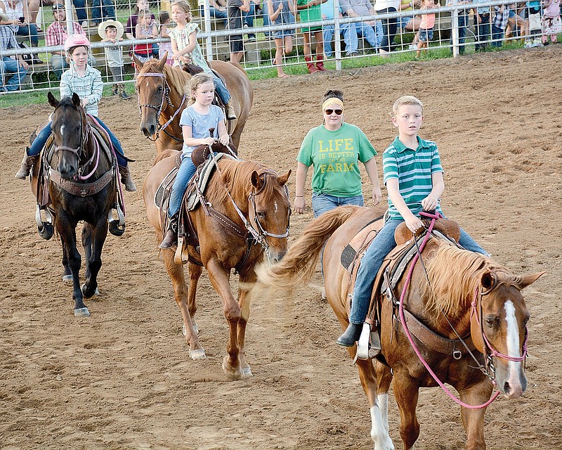 Graham Thomas/Siloam Sunday
Young riders enjoyed the Kids Grand Entry on Thursday at the 62nd annual Siloam Springs Rodeo in July 2020. The rodeo returns this Thursday, Friday and Saturday.