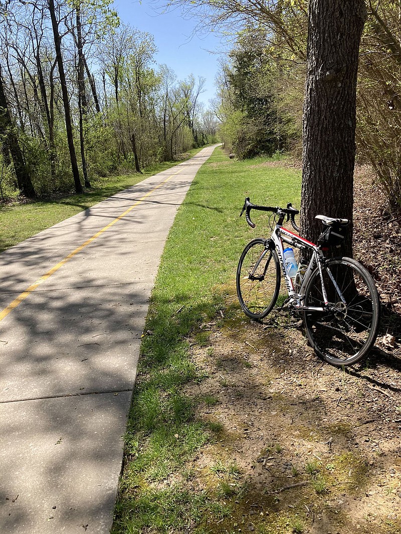 Railyard Loop offers a 15-mile bicycle ride around Rogers. The route, seen here in May 2021, takes in woods, neighborhoods, industrial areas and part of the Razorback Greenway. 
(NWA Democrat-Gazette/Flip Putthoff)