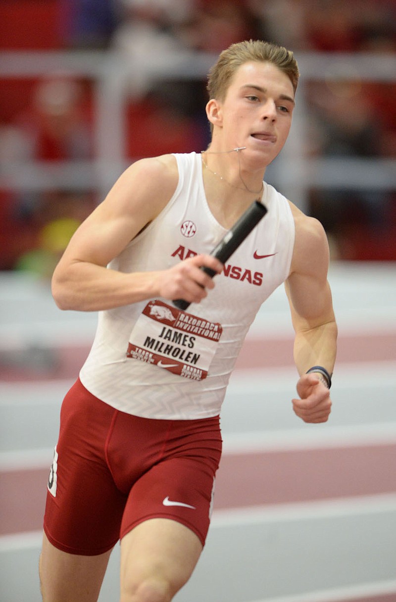 Arkansas' James Milholen competes Saturday, Feb. 1, 2020, in the 400-meter relay during the Razorback Invitational in the Randal Tyson Track Center in Fayetteville. Milholen, a former Bentonville West track standout, did not make the relay team as a sophomore at Bentonville High, but his determination led to being a key member of this year's quarter-mile relay team for the University of Arkansas.
(NWA Democrat-Gazette/Andy Shupe)
