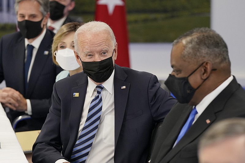 The Associated Press
President Joe Biden talks with Secretary of Defense Lloyd Austin, right, during a bilateral meeting with Turkish President Recep Tayyip Erdogan while attending the NATO summit at NATO headquarters in Brussels on Monday.