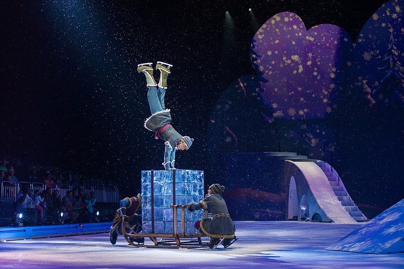 Kristoff (Ryan Santee) makes a different kind of contact with the "ice" in “Disney On Ice Presents Dare to Dream.” (Special to the Democrat-Gazette)
