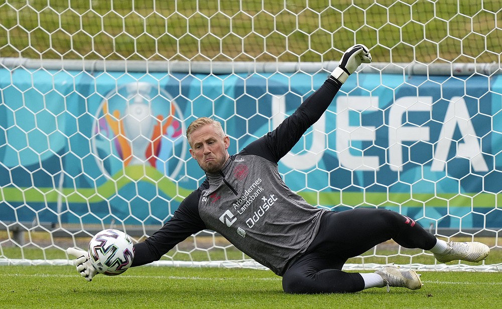 Denmark's goalkeeper Kasper Schmeichel exercises at the training ground during a training session of Denmark's national team in Helsingor, Denmark, Monday, June 14, 2021. It is the first training of the Danish team since the Euro championship soccer match against Finland when Christian Eriksen collapsed last Saturday. (AP Photo/Martin Meissner)