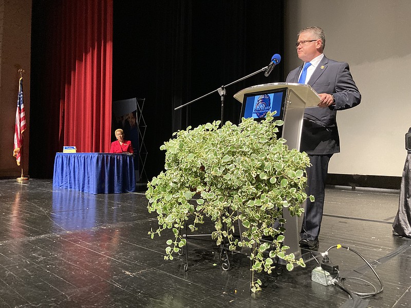 Kingsland, Ga., Police Chief Robert Jones listens to a question being asked at a community forum Monday night at the Pine Bluff Convention Center, as Mayor Shirley Washington looks on. (Pine Bluff Commercial/Byron Tate)