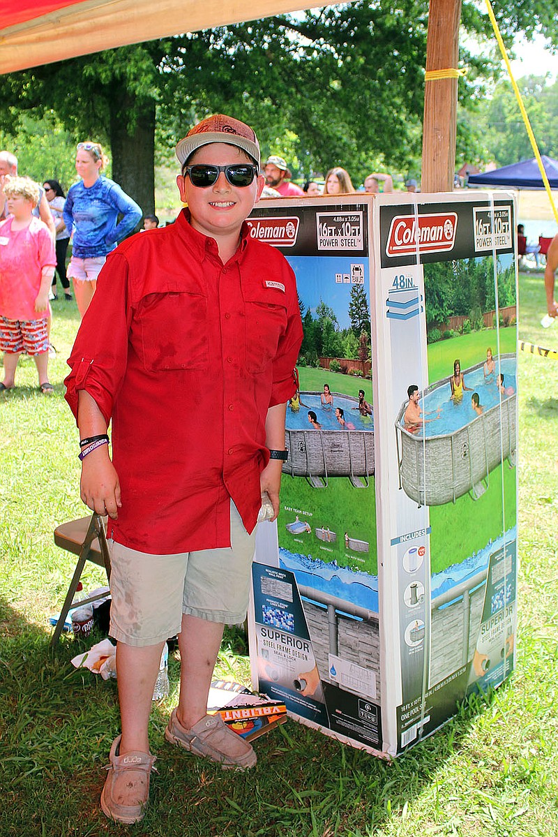 MEGAN DAVIS/MCDONALD COUNTY PRESS The grand prize went home with 11-year-old Kadyn Johnston who was able to catch the most fish throughout the day. Johnston caught 25 fish during the 2-hour derby using his tried-and-true bait - worms.