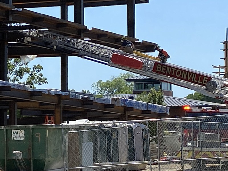 Bentonville firefighters respond to an emergency at a construction site downtown on Tuesday, June 15, 2021.