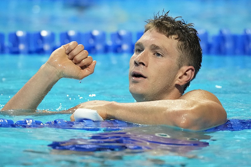 Ryan Murphy reacts after winning the men's 100 backstroke during wave 2 of the U.S. Olympic Swim Trials on Tuesday, June 15, 2021, in Omaha, Neb. (AP Photo/Charlie Neibergall)