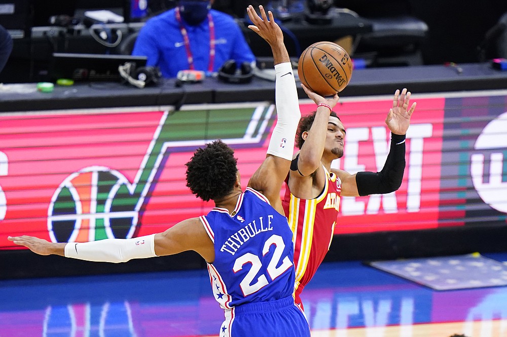 Atlanta Hawks' Trae Young, right, is fouled by Philadelphia 76ers' Matisse Thybulle during the second half of Game 5 in a second-round NBA basketball playoff series, Wednesday, June 16, 2021, in Philadelphia. (AP Photo/Matt Slocum)