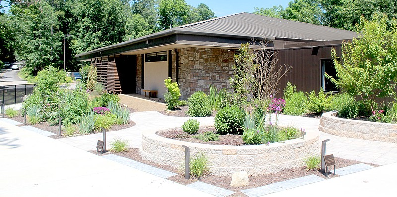 Keith Bryant/The Weekly Vista
A garden, designed and built by Kathy and Dan Jeffrey,  fills out an outdoor portion of the Bella Vista Public Library, which wrapped up its expansion last year.
