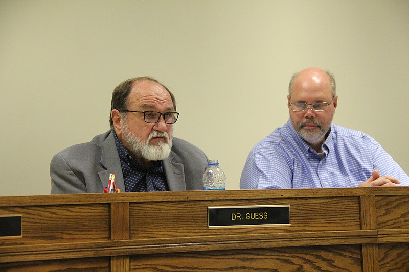 Watson Chapel School District Superintendent Jerry Guess (left) gives his final report in a school board meeting as board President Kevin Moore on Monday, June 14, 2021. (Pine Bluff Commercial/Eplunus Colvin)