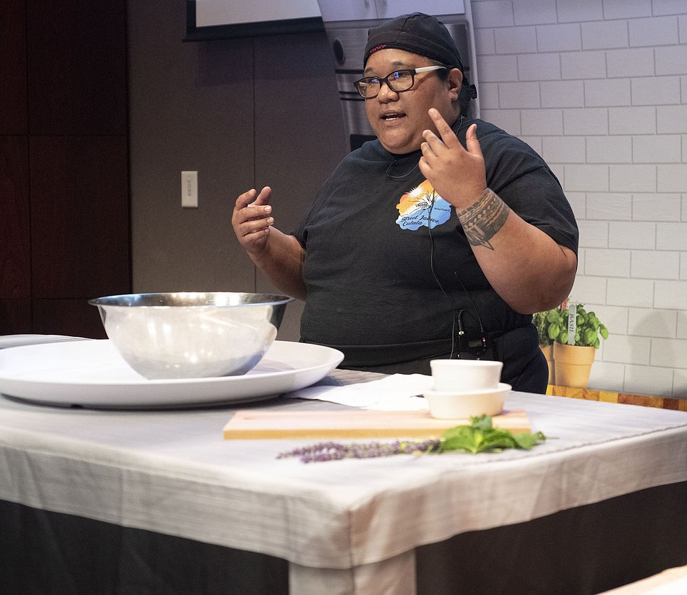 Chef Judy Tatios leads a demonstration about how to make coleslaw Thursday June 17, 2021 during a a health summit for school superintendents and heads of child nutrition hosted by the Northwest Arkansas Council at the University of Arkansas in Fayetteville. Tatios is from southern California but calls Northwest Arkansas home now where she specializes in Marshallese cuisine.Visit nwaonline.com/2100618Daily/ and nwadg.com/photo. (NWA Democrat-Gazette/J.T. Wampler)