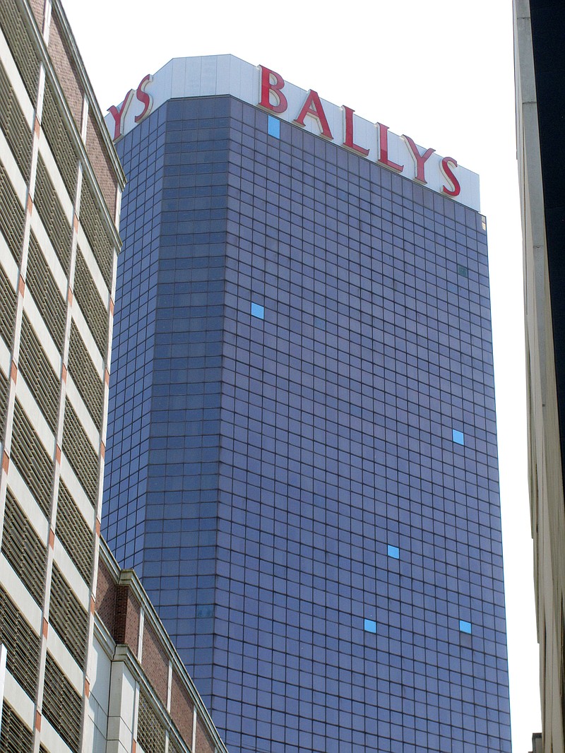 This Oct. 1, 2020 photo shows the exterior of Bally's casino in Atlantic City N.J.  The new owners of Bally's Atlantic City are attempting to revive a comatose casino in perhaps the most cutthroat gambling market in America. Rhode Island-based Bally's Corporation is spending at least $90 million on the Boardwalk casino over the next five years, including hotel room makeovers, a renovation of the casino floor, new slot machines and restaurants, and more live entertainment. (AP Photo/Wayne Parry)