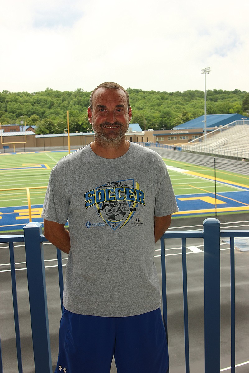 Lakeside head soccer coach Craig Moses stands on the balcony overlooking Chick Austin Stadium on June 8. - Photo by James Leigh of The Sentinel-Record