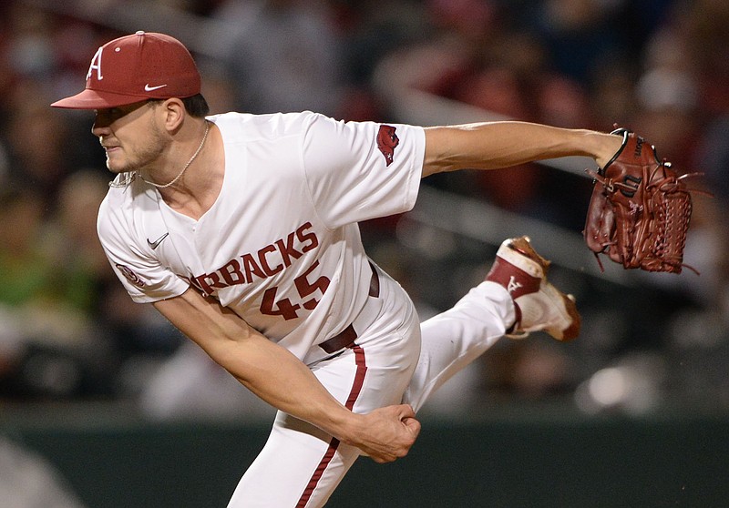 Arkansas reliever Kevin Kopps follows through with a pitch during the seventh inning of a May 7 against Georgia at Baum-Walker Stadium in Fayetteville. Kopps was awarded the Dick Howser Trophy and the Stopper of the Year award by the National Collegiate Baseball Writers Association Friday. - Photo by Andy Shupe of NWA Democrat-Gazette