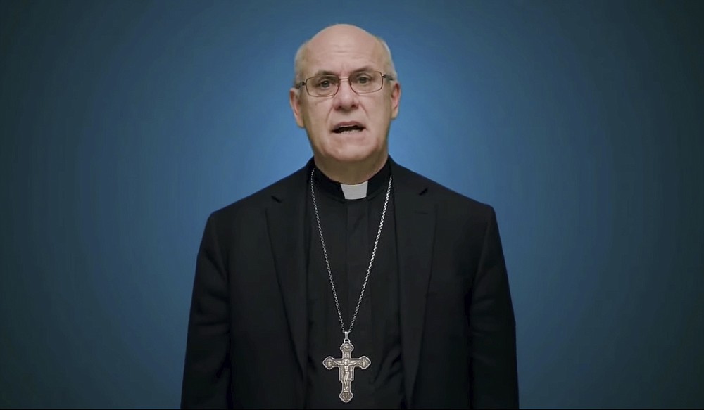 In this photo taken from video, Bishop Kevin Rhoades of Fort Wayne-South Bend, Ind., head of the doctrine committee for the U.S Conference of Catholic Bishops, addresses the body's virtual assembly regarding a formal statement on the meaning of the Eucharist in the life of the church on Thursday, June 17, 2021. (United States Conference of Catholic Bishops via AP)