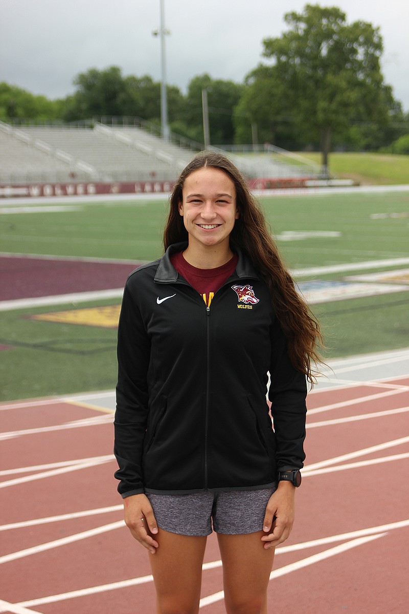 Lake Hamilton junior Olivia Pielemeier stands on the track at Wolf Stadium on June 7. - Photo by James Leigh of The Sentinel-Record