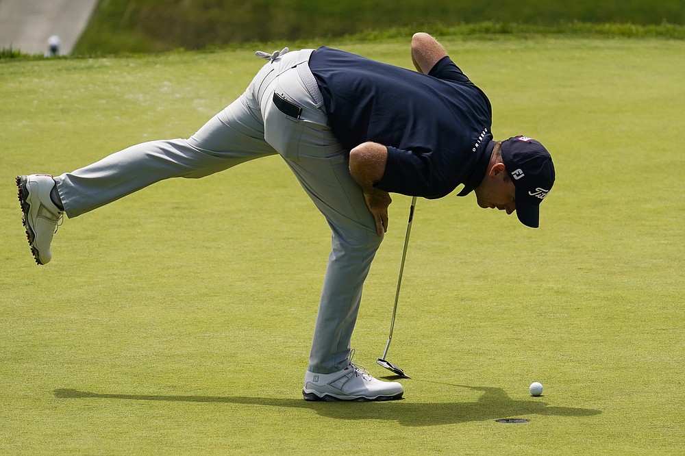 Russell Henley looks at his ball after missing a putt on the 13th green during the second round of the U.S. Open Golf Championship, Friday, June 18, 2021, at Torrey Pines Golf Course in San Diego. (AP Photo/Gregory Bull)