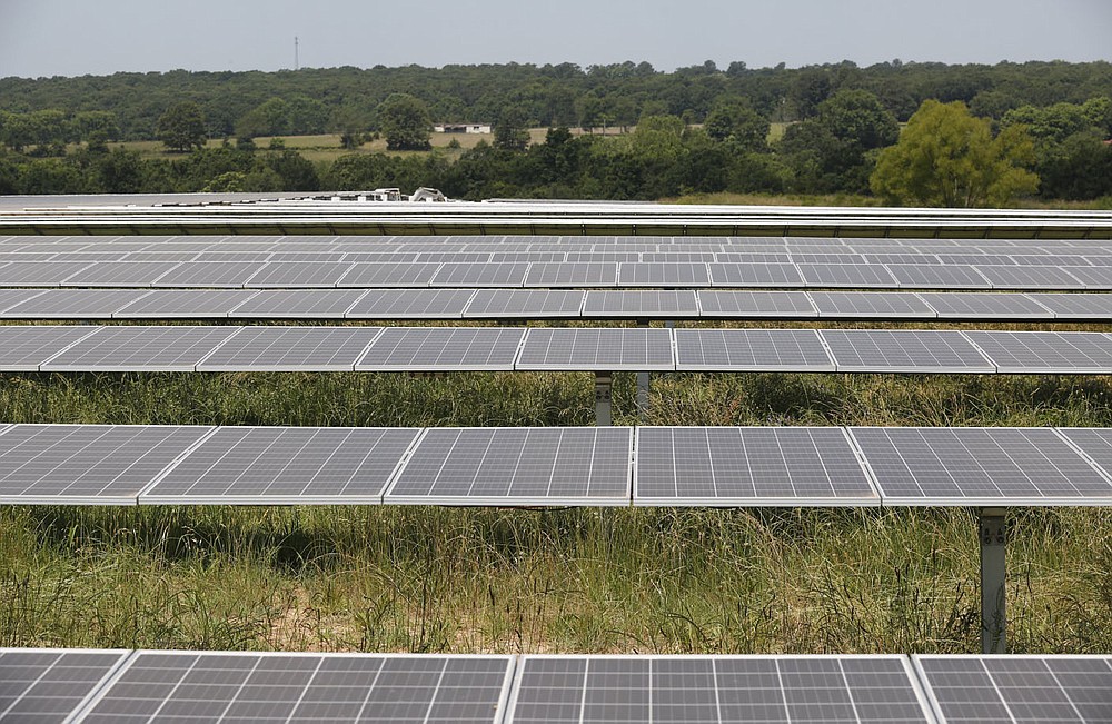 A section of the new solar panels and inverters Wednesday, June 15, 2021, at the new Solar Park being built by Ozark Electric Cooperative and Today's Power Inc. near Lincoln. The 25 acre park will service five entities with 2.7 megawatts of solar panels. Check out nwaonline.com/210620Daily/ and nwadg.com/photos for a photo gallery.
(NWA Democrat-Gazette/David Gottschalk)