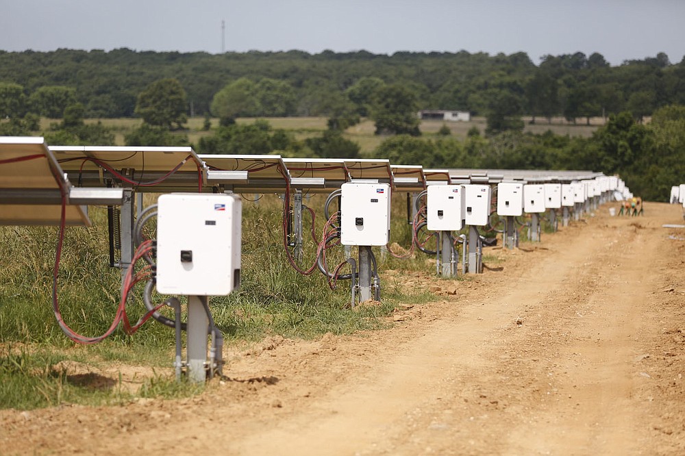 A section of the new solar panels and inverters Wednesday at the new Solar Park being built by Ozark Electric Cooperative and Today's Power Inc. near Lincoln. The 25-acre park will service five entities with 2.7 megawatts of solar panels. Check out nwaonline.com/210620Daily/ and nwadg.com/photos for a photo gallery.
(NWA Democrat-Gazette/David Gottschalk)